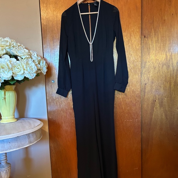 Deep V Black Jumpsuit with Sheer Sleeves by Forever 21 - Picture 1 of 10
